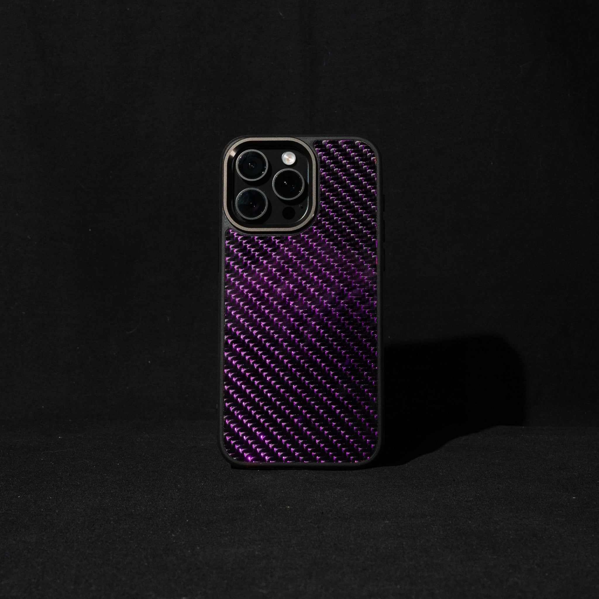 purple carbon fiber phone case on a black background