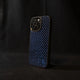Blue carbon fiber phone case on a black background angled sideways
