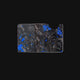 Forged carbon cardholder with blue flakes on a white background